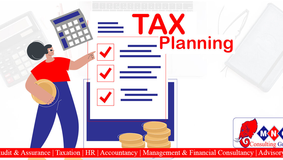 Business professionals discussing tax documents and charts, implementing strategic tax planning for financial success and reduced liabilities